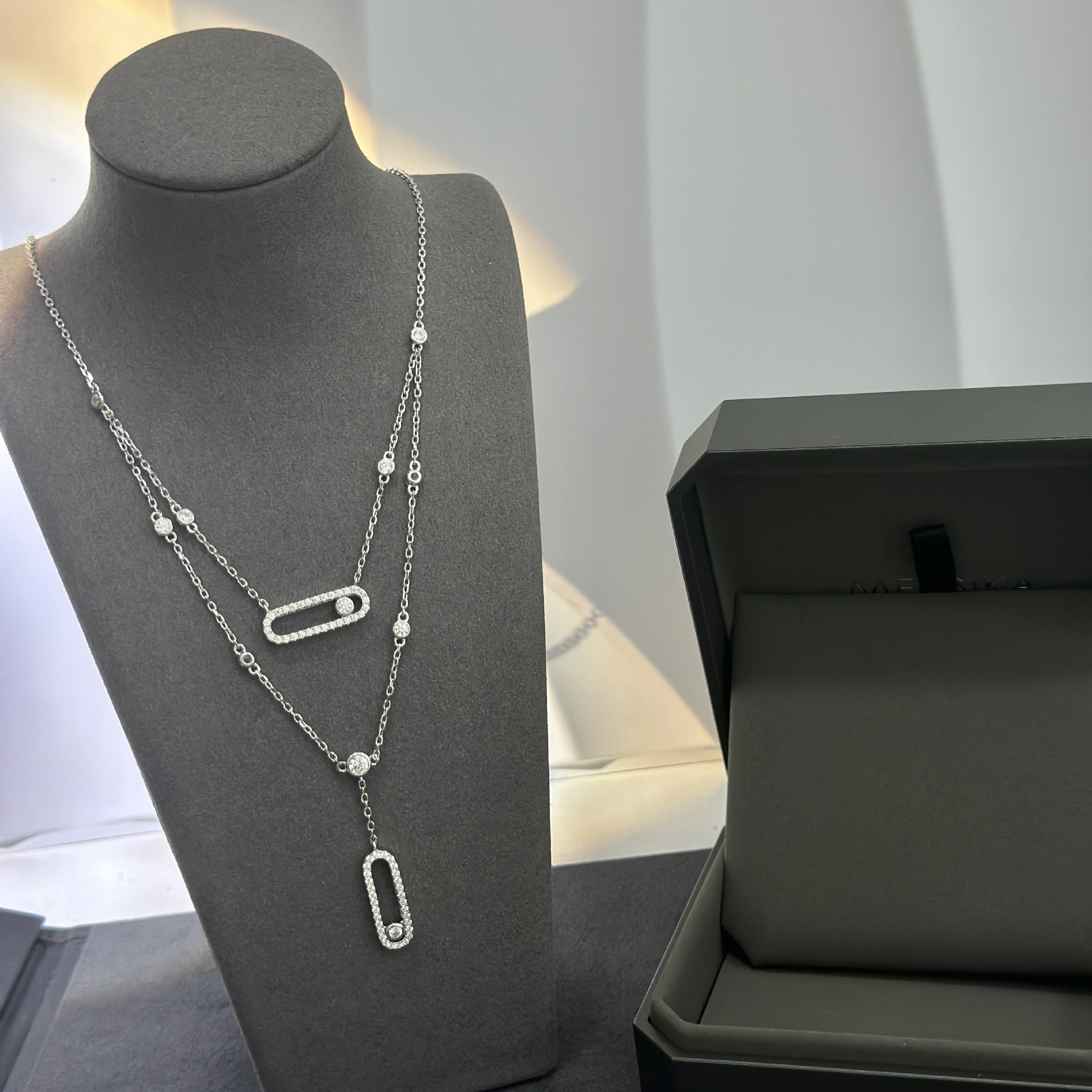 Mei Family Double Layer Necklace in Sterling Silver S925 with Slide Pendant: A versatile and chic choice for any occasion, this elegant clavicle necklace is a versatile piece. Mei Family Double Layer Necklace in Sterling Silver S925 with Slide Pendant: A versatile and chic choice for any occasion, this elegant clavicle necklace is a versatile piece.