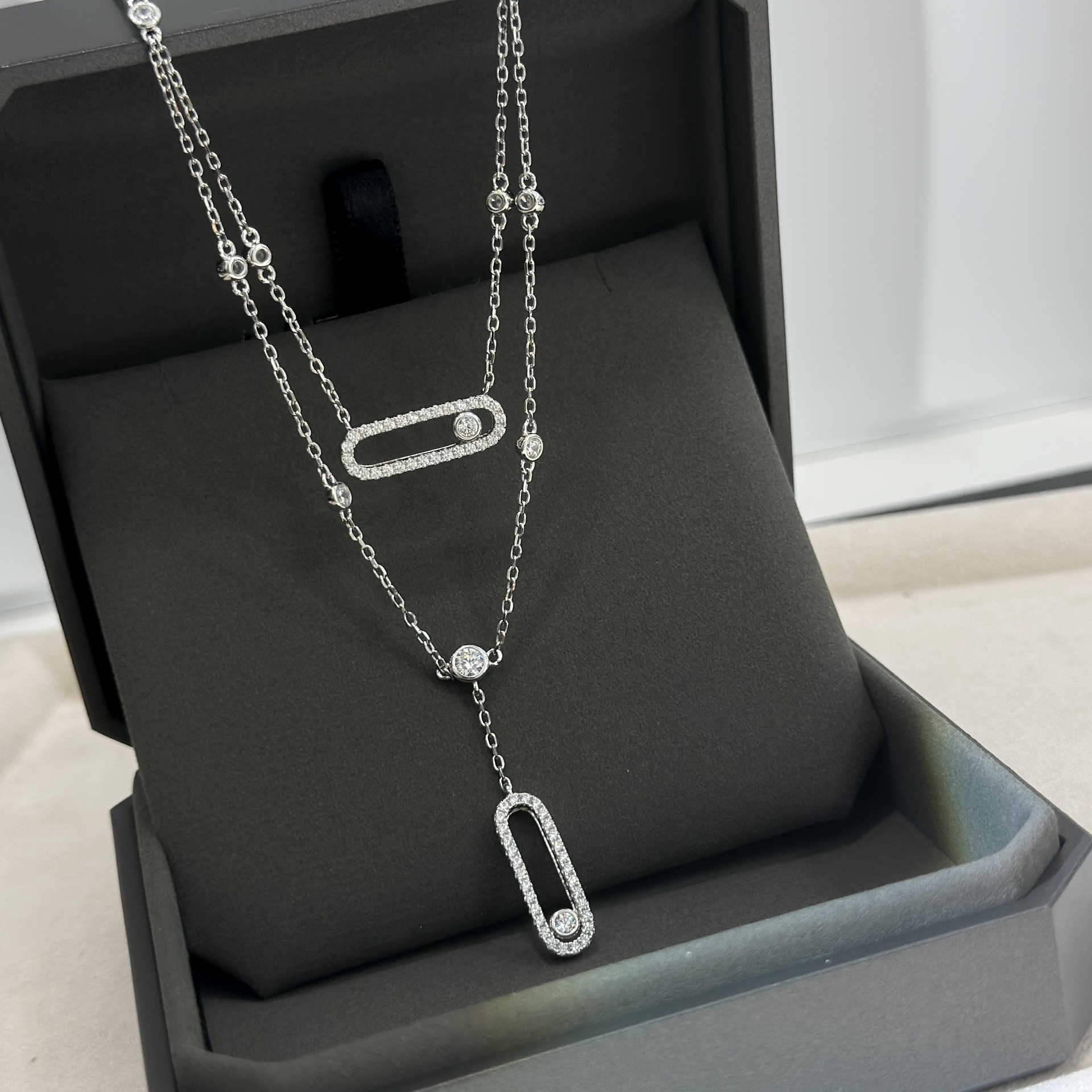 Mei Family Double Layer Necklace in Sterling Silver S925 with Slide Pendant: A versatile and chic choice for any occasion, this elegant clavicle necklace is a versatile piece. Mei Family Double Layer Necklace in Sterling Silver S925 with Slide Pendant: A versatile and chic choice for any occasion, this elegant clavicle necklace is a versatile piece.