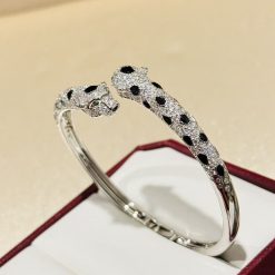 S925 Sterling Silver Double-headed Leopard Print Bracelet with Solid Diamond Design - Classic half diamond design, high-end feel, blue eyes exude nobility