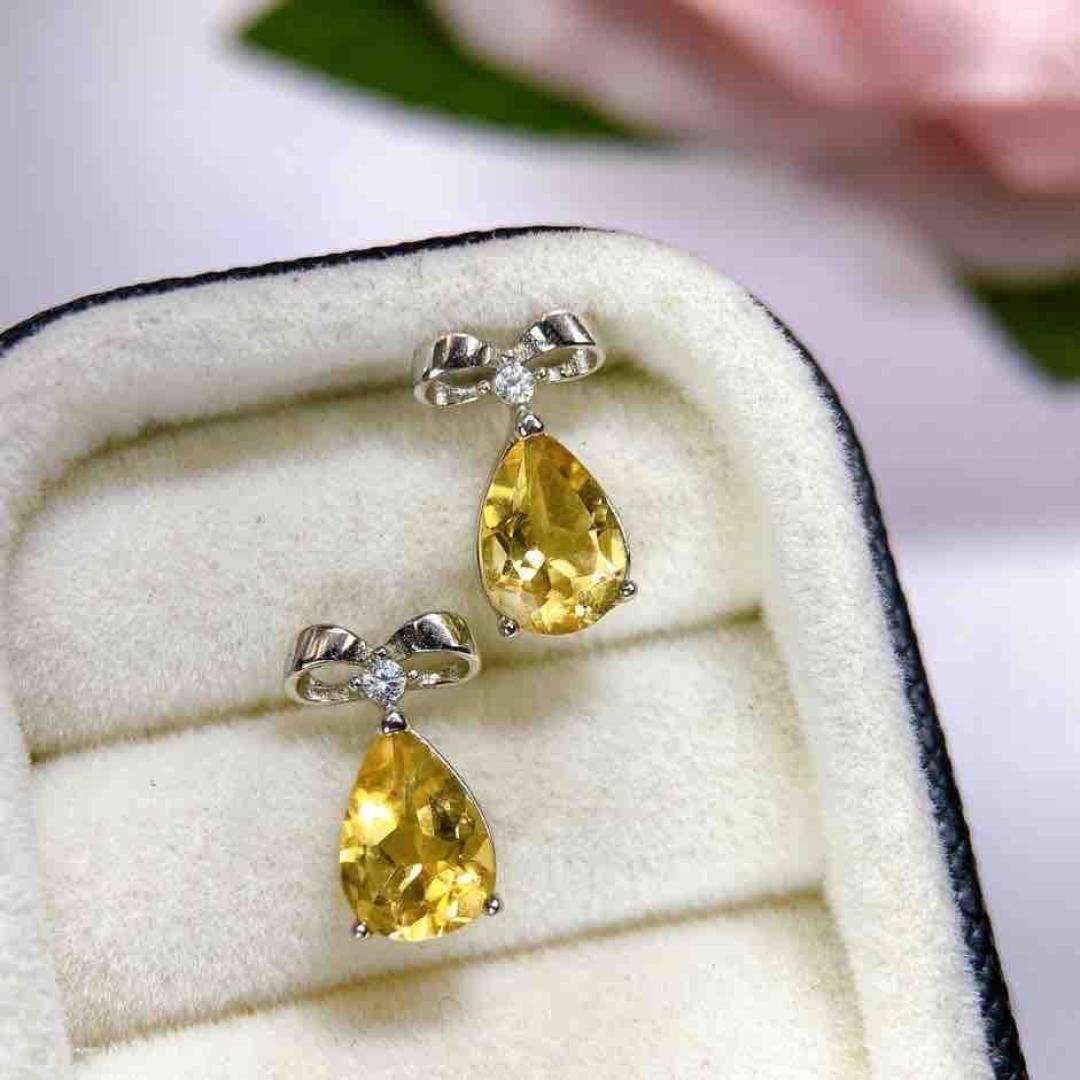 New design, elegant and natural yellow crystal earrings with silver plating (925 sterling silver) New design, elegant and natural yellow crystal earrings with silver plating (925 sterling silver)
